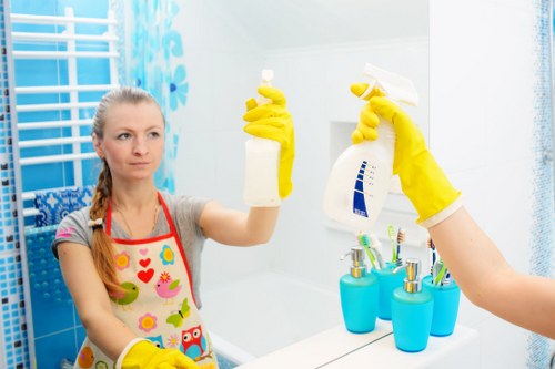 Move out cleaning in a kitchen with appliances and cabinets