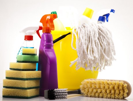 Vacuuming and dusting a rental property before checkout